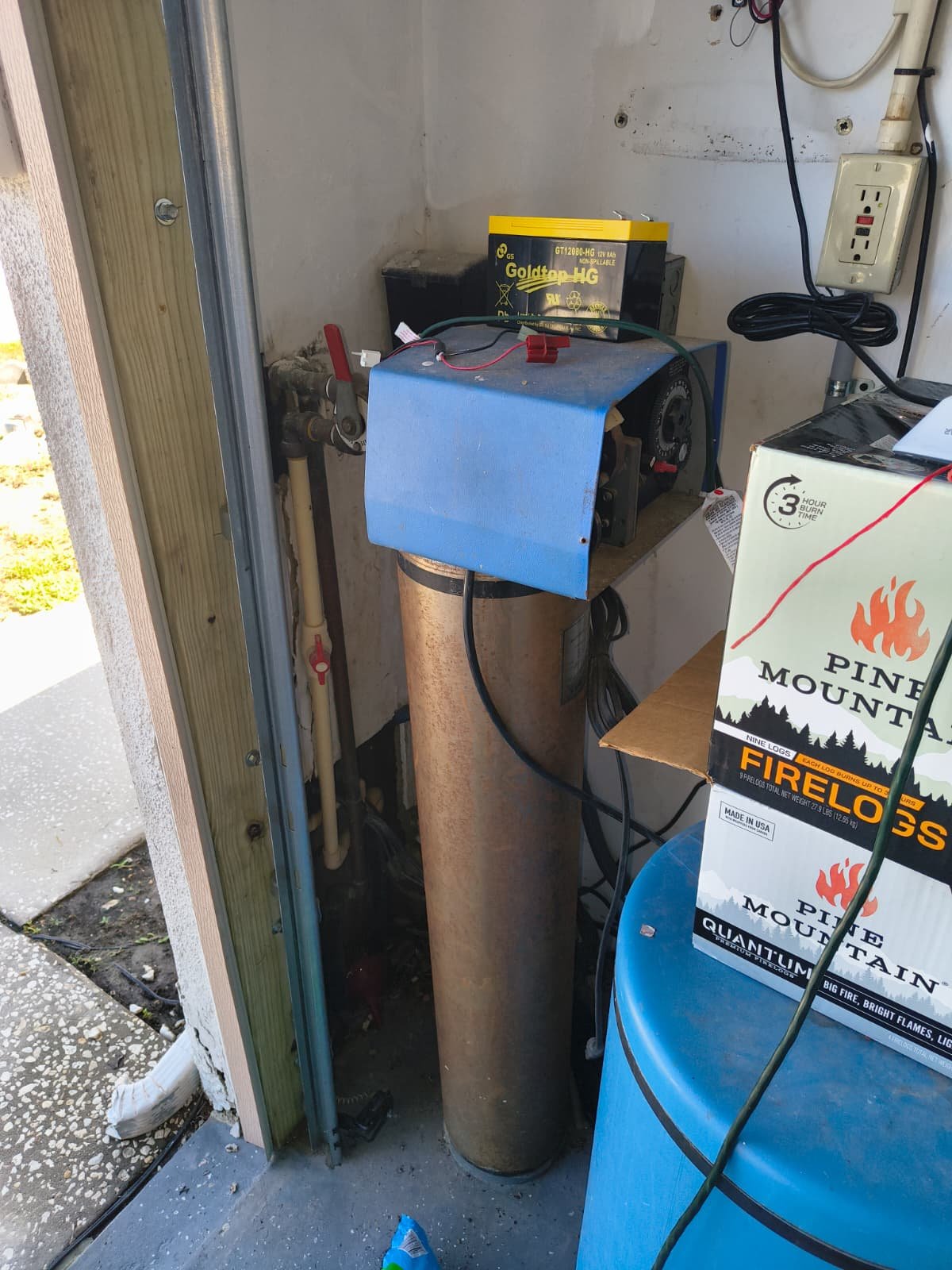 Water Softener System in Tampa, FL 33635 Water softener system in garage corner in Tampa, FL 33635.