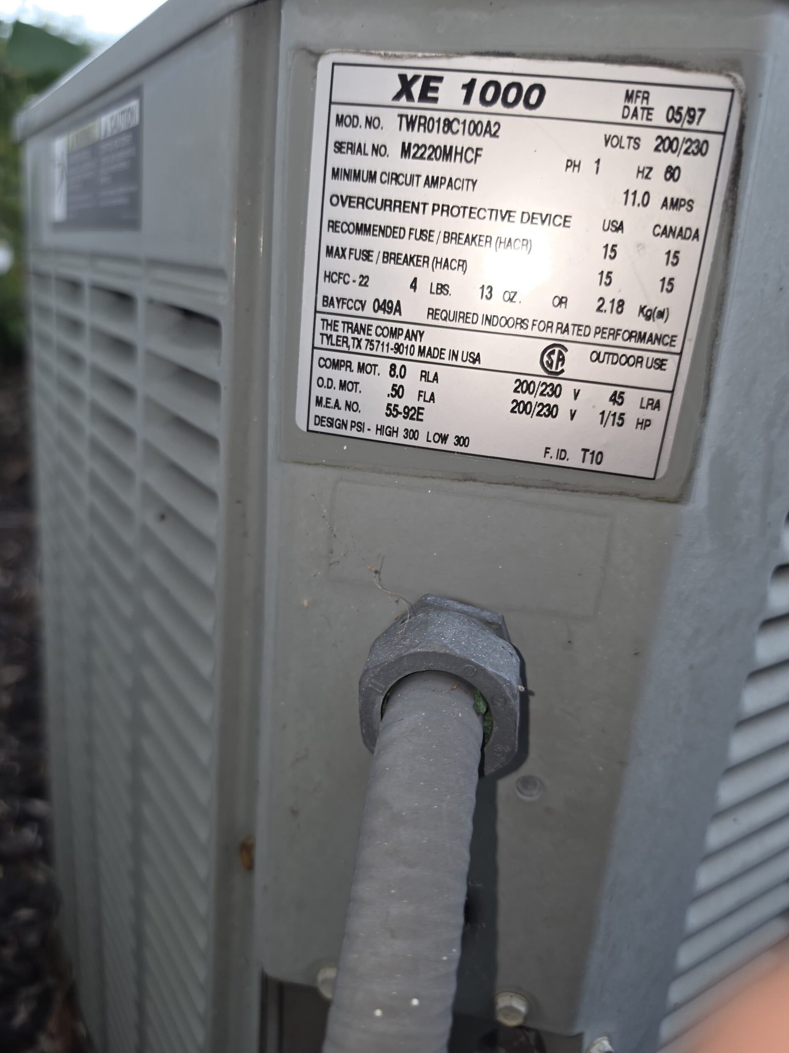 Close-up of label on XE 1000 AC unit, Lutz, FL 33558.