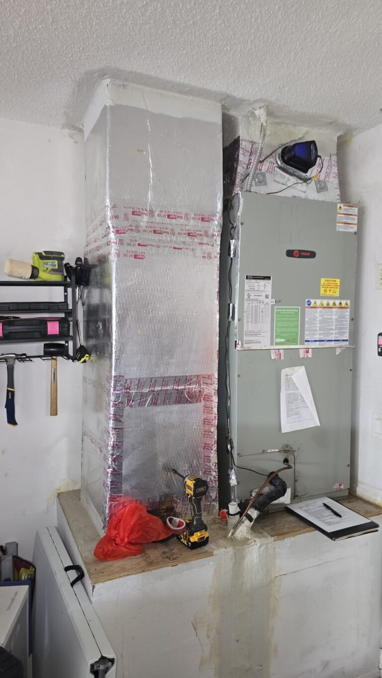 Air Handler Unit with Ductwork in Tampa, FL 33624 Air handler unit with ductwork in garage, Tampa, FL 33624