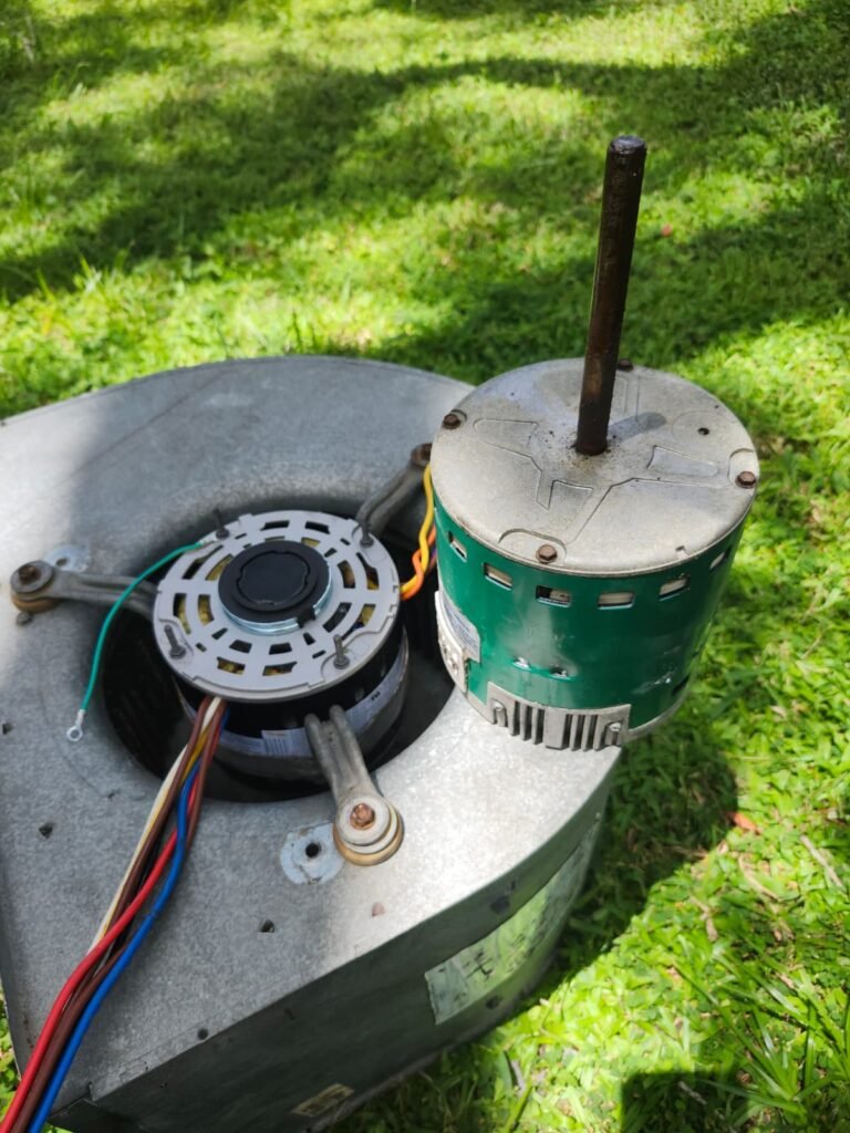 A blower motor and housing pulled from an air handler in Tampa, FL 33604.