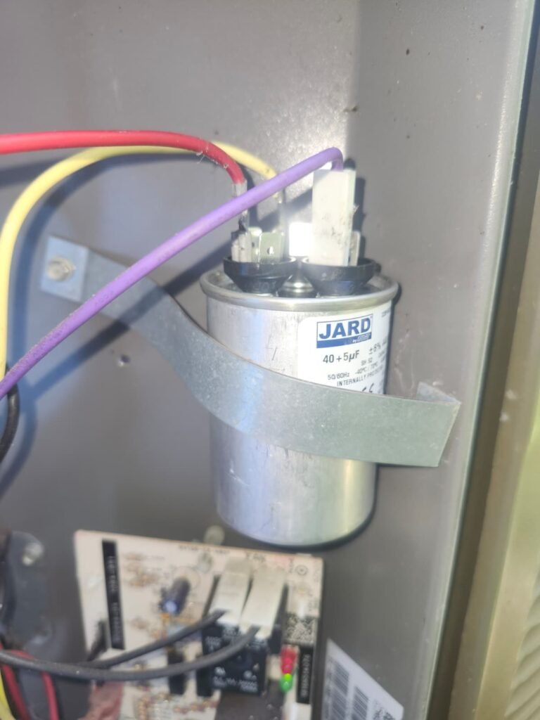 Capacitor Replacement Detail in Lutz, FL 33558 Close-up of capacitor replacement in Lutz, FL 33558