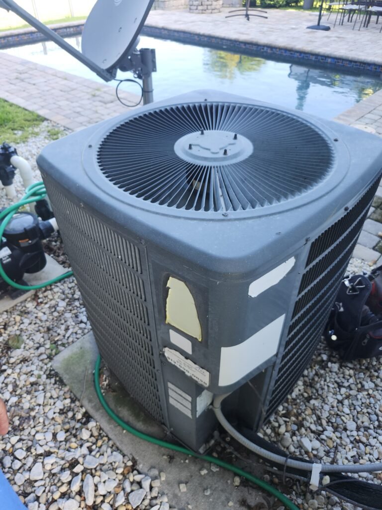 Outdoor condenser unit with exposed wiring in Ruskin, FL 33573