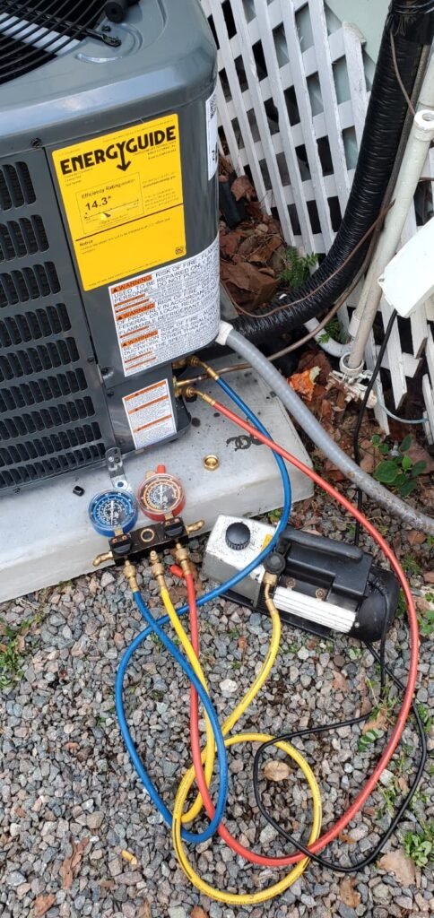 Condenser unit with gauges during installation, Tampa, FL 33605