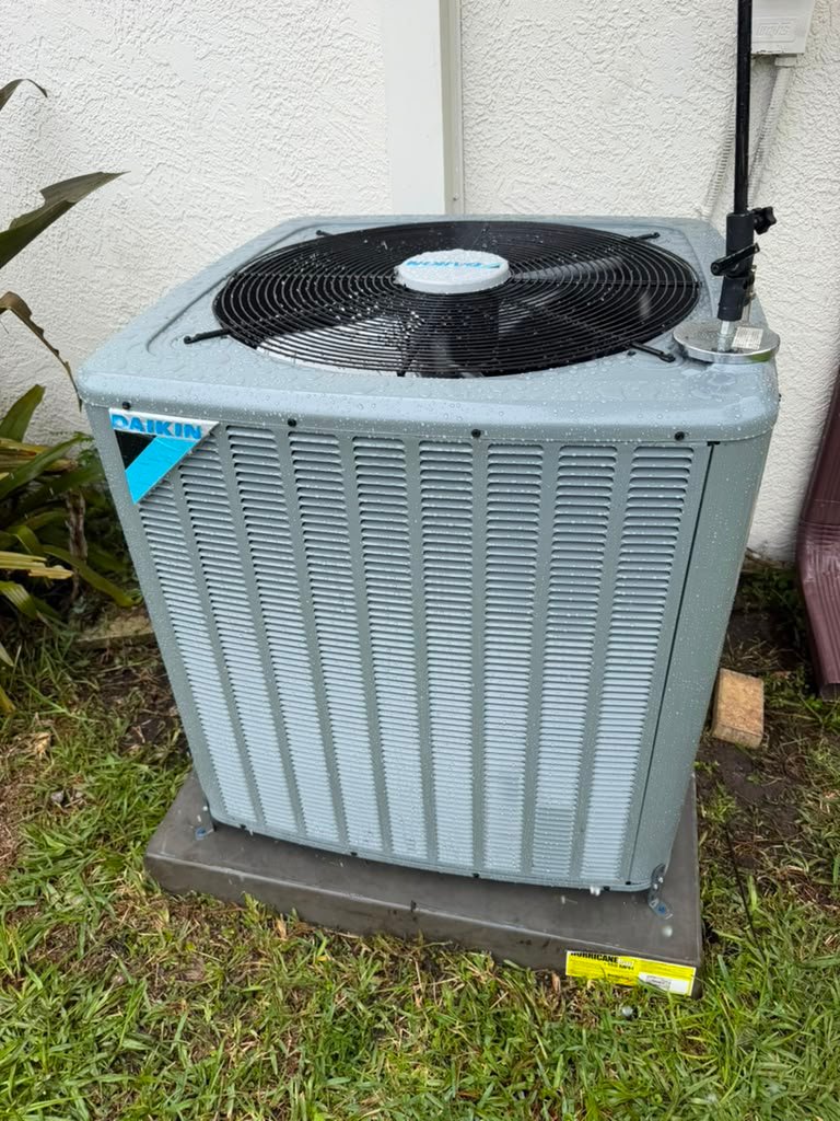 A Daikin condenser on its pad in Odessa, FL 33556.