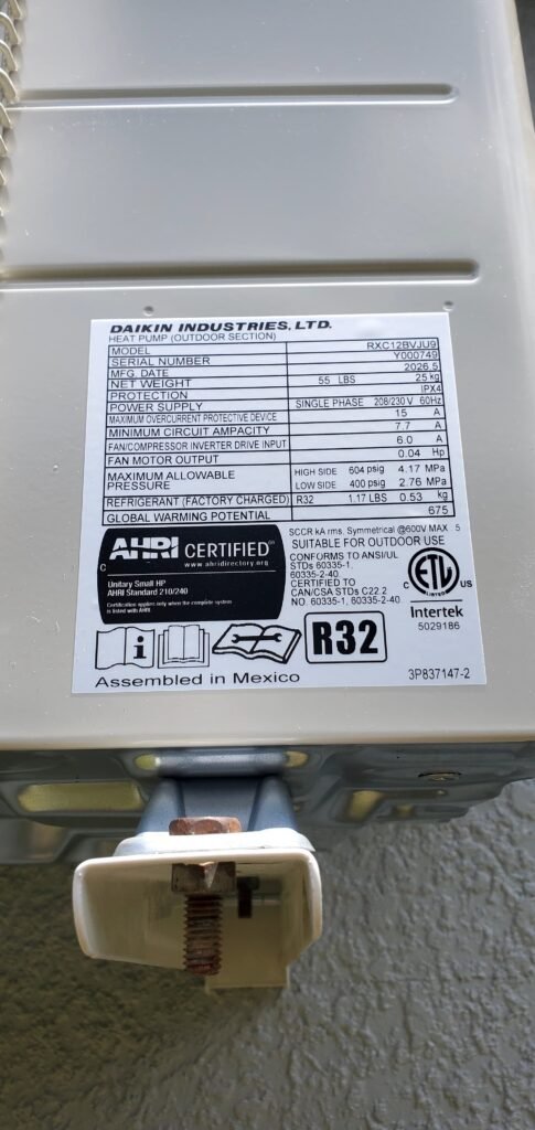 A Daikin unit’s data label marked R32 in Land O’ Lakes, FL 34638.