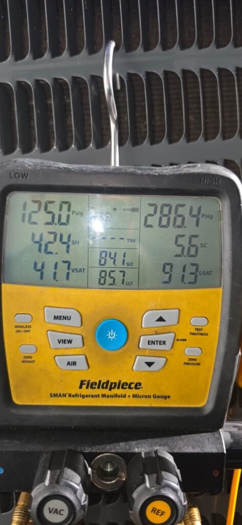 Digital gauge readings during HVAC service in Tampa, FL 33603
