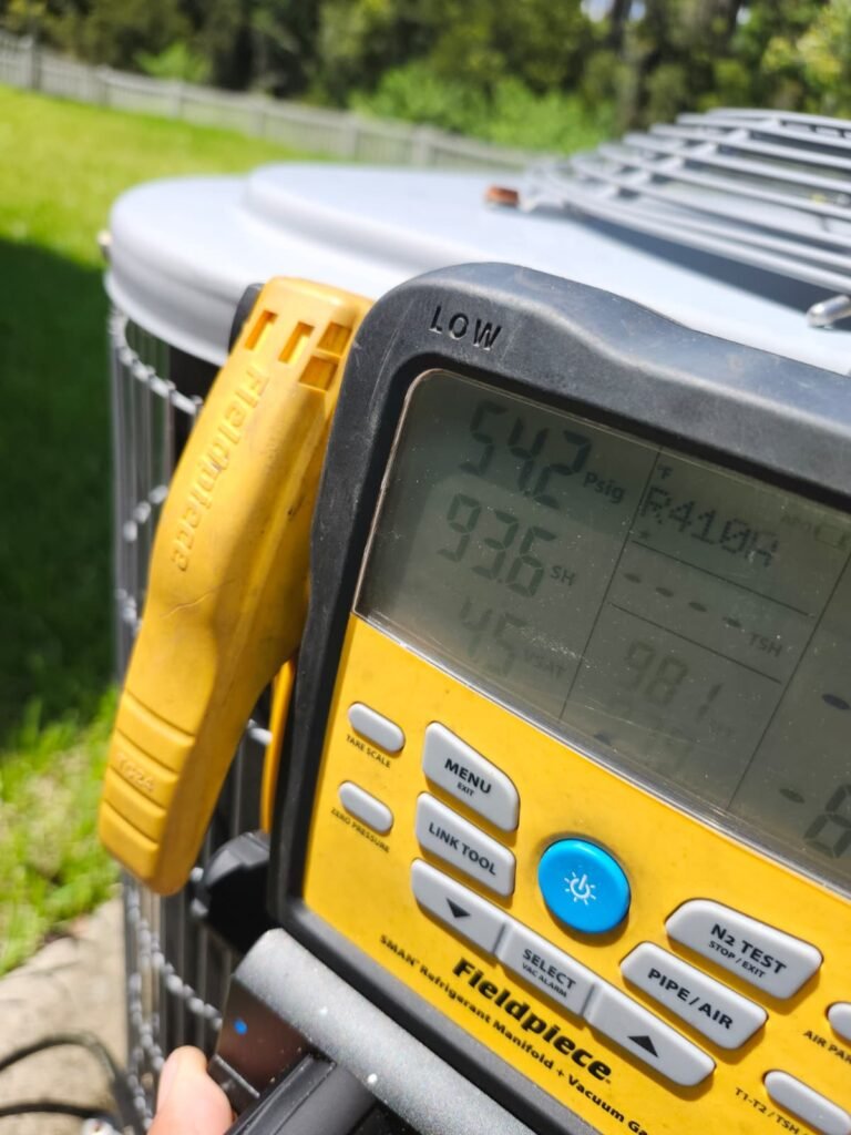 Digital Manifold Gauge with HVAC Unit in Tampa, FL 33647 Digital manifold gauge with HVAC unit in Tampa, FL 33647