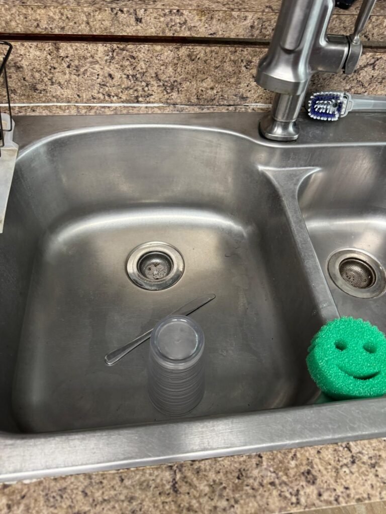 Double Sink After Drain Unclogging in Lutz, FL 33559 Double sink after sewer drain unclogging in Lutz, FL 33559