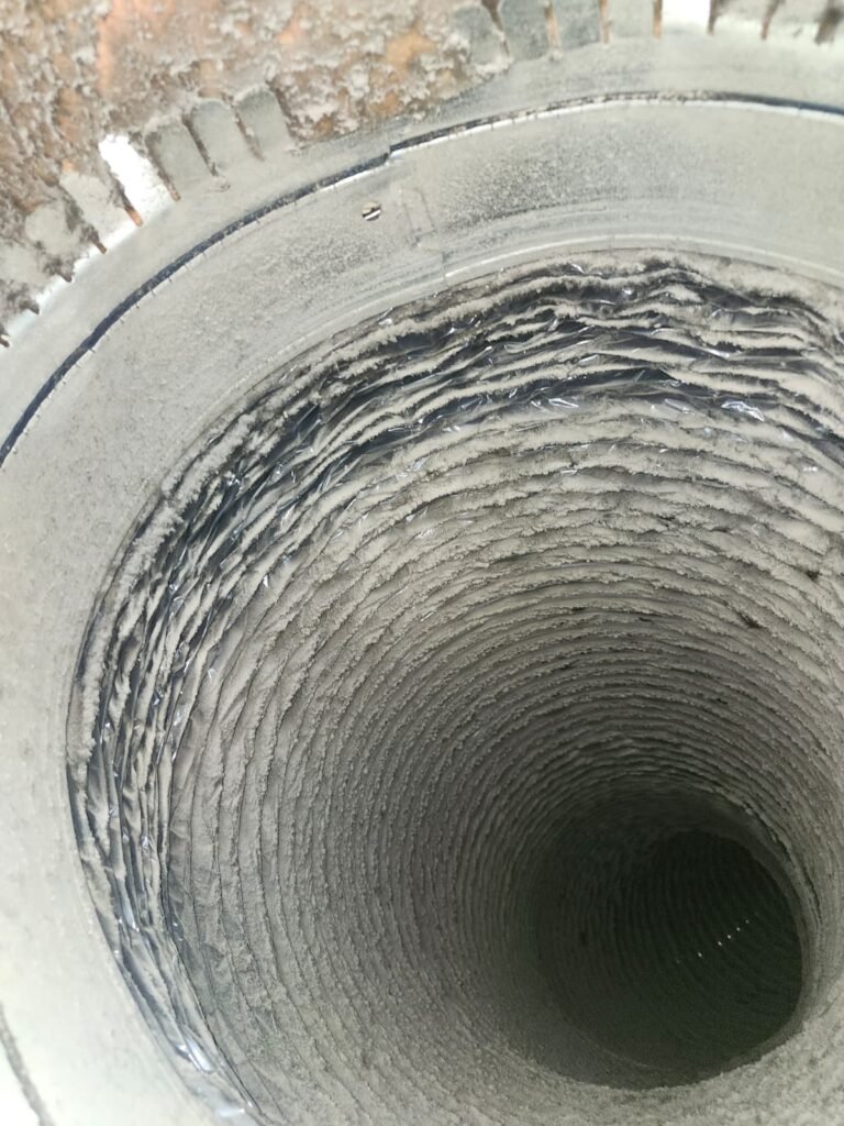 The dusty inside of a flex duct run in Tampa, FL 33605.