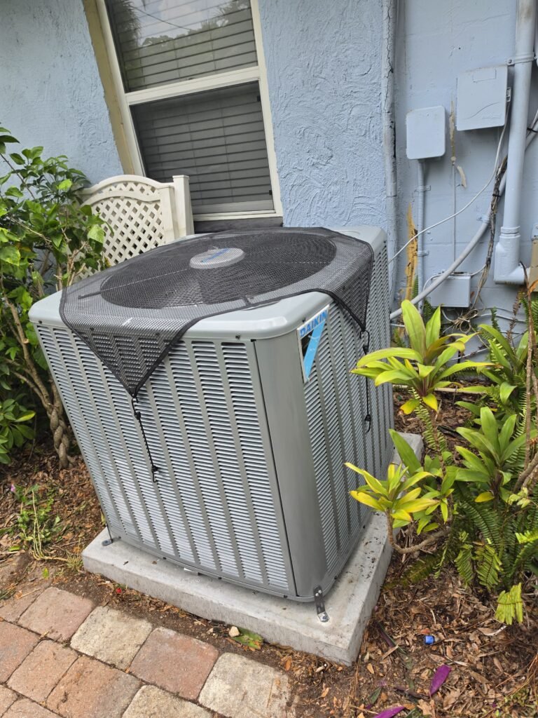 Exterior HVAC Condenser Unit in Tampa, FL 33611 Exterior HVAC condenser unit in Tampa, FL 33611 on concrete pad.