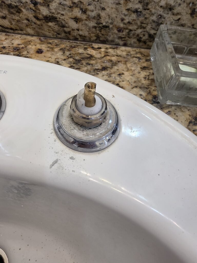 Close-up of faucet component on bathroom sink in Tampa, FL 33629