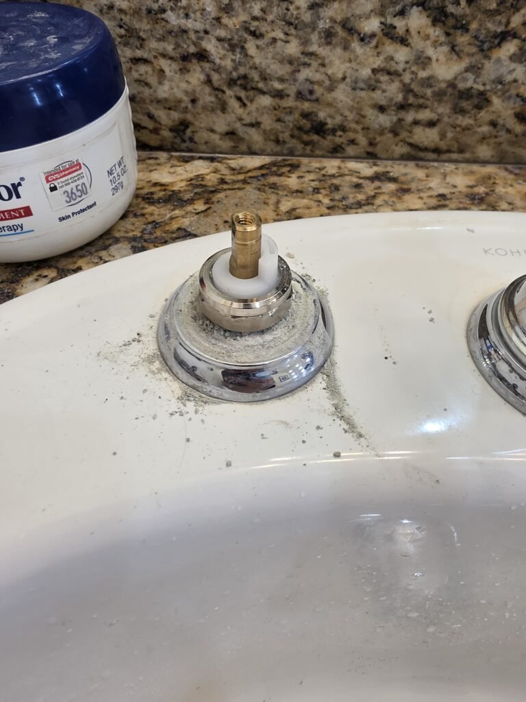 Close-up of faucet component on bathroom sink in Tampa, FL 33629
