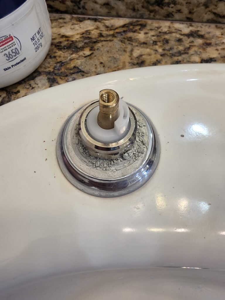 Close-up of faucet component on bathroom sink in Tampa, FL 33629