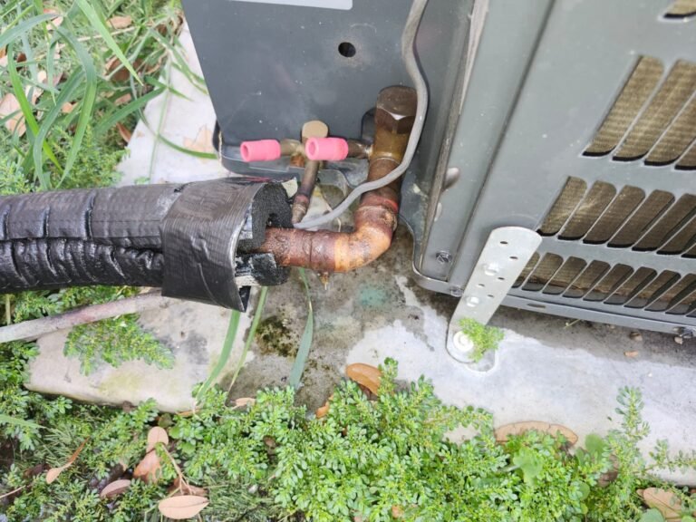 Technician holding HVAC component in Tampa, FL 33607