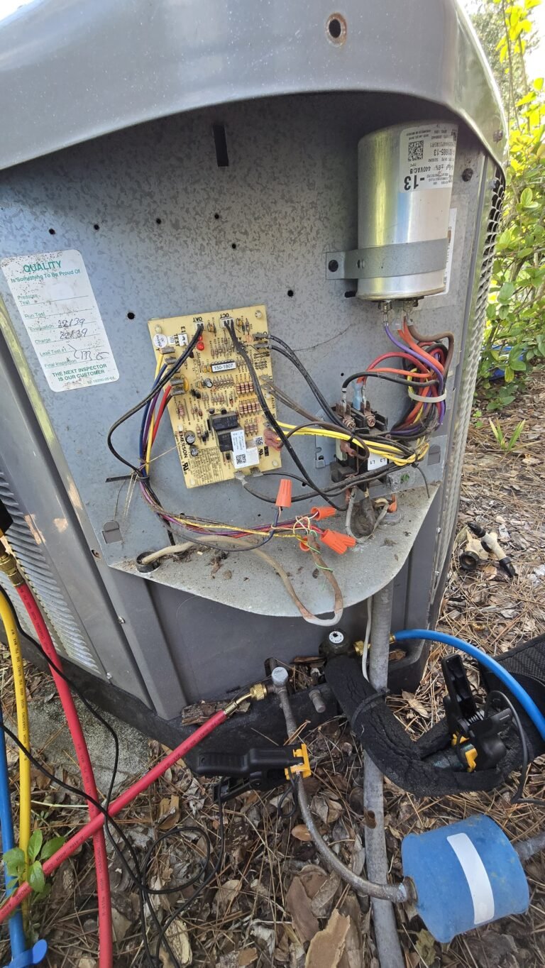 Open HVAC condenser with wiring in Tampa, FL 33610