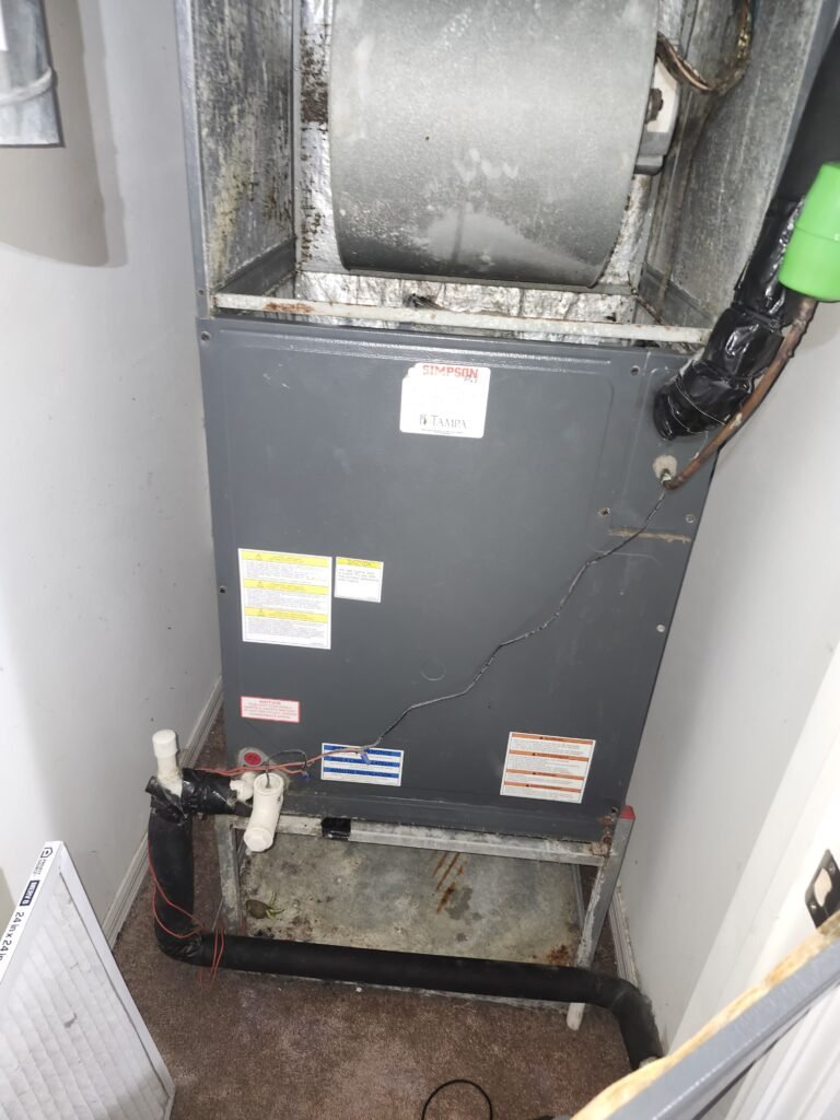 HVAC unit with exposed components in Ruskin, FL 33573