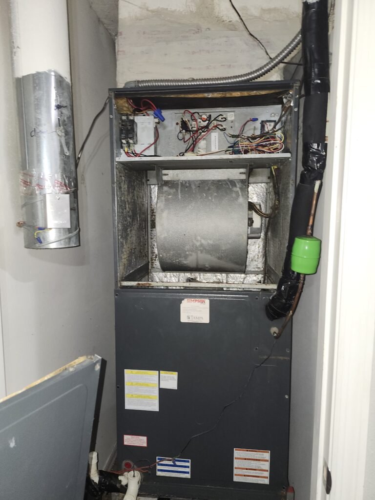 HVAC unit with exposed wiring in Ruskin, FL 33573
