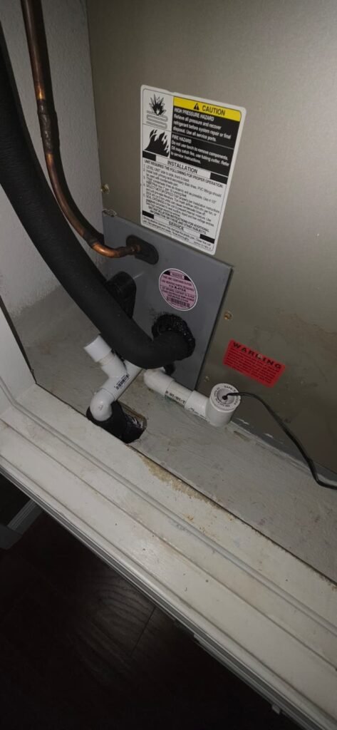 Close-up of piping and labels on HVAC unit, Trinity, FL 34655