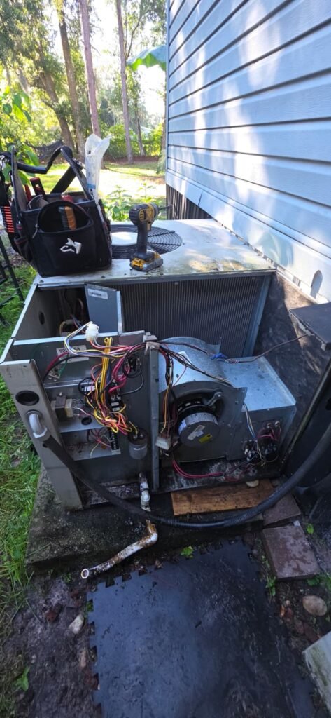HVAC Repair in Spring Hill, FL 34610 HVAC unit with exposed wiring during repair in Spring Hill, FL 34610