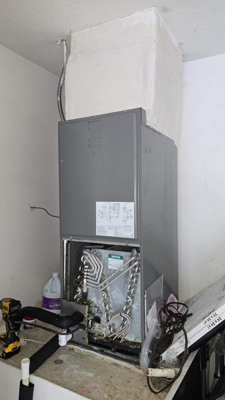 HVAC unit with exposed components during service in Tampa, FL 33610