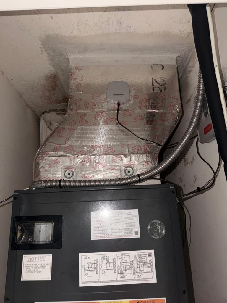 Top section of HVAC unit with ductwork, Ruskin, FL 33573