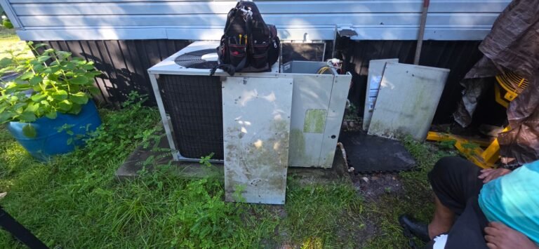HVAC Unit Repair in Spring Hill, FL 34610 HVAC unit with panels removed during repair in Spring Hill, FL 34610