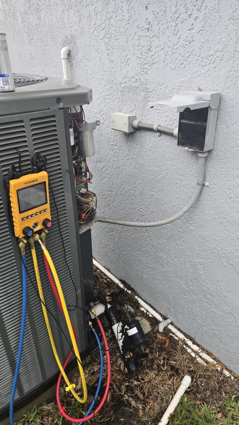 HVAC Unit Service with Open Panel in Tampa, FL 33624 HVAC unit with open panel and gauges during service in Tampa, FL 33624