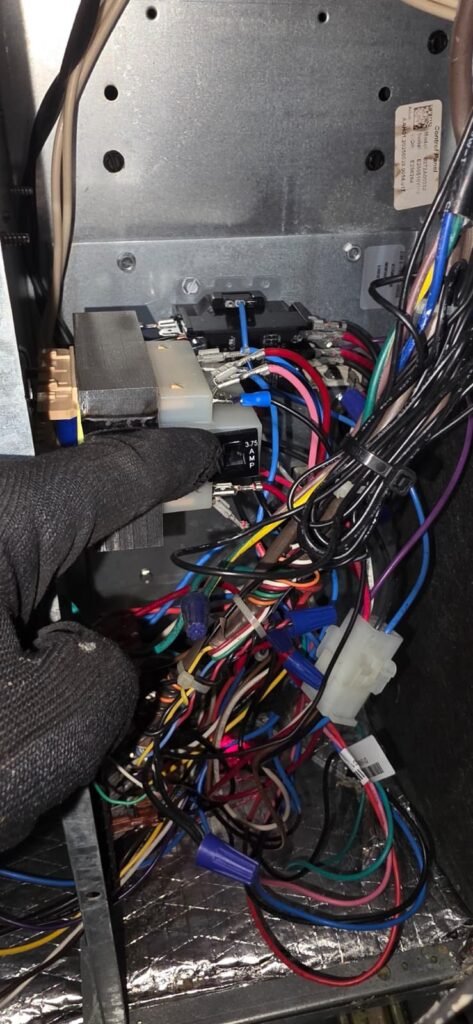 Technician working on HVAC wiring in Tampa, FL 33607