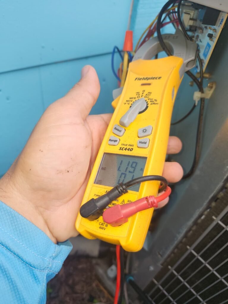Multimeter Measuring in St. Petersburg, FL 33711 Multimeter measuring during HVAC service in St. Petersburg, FL 33711
