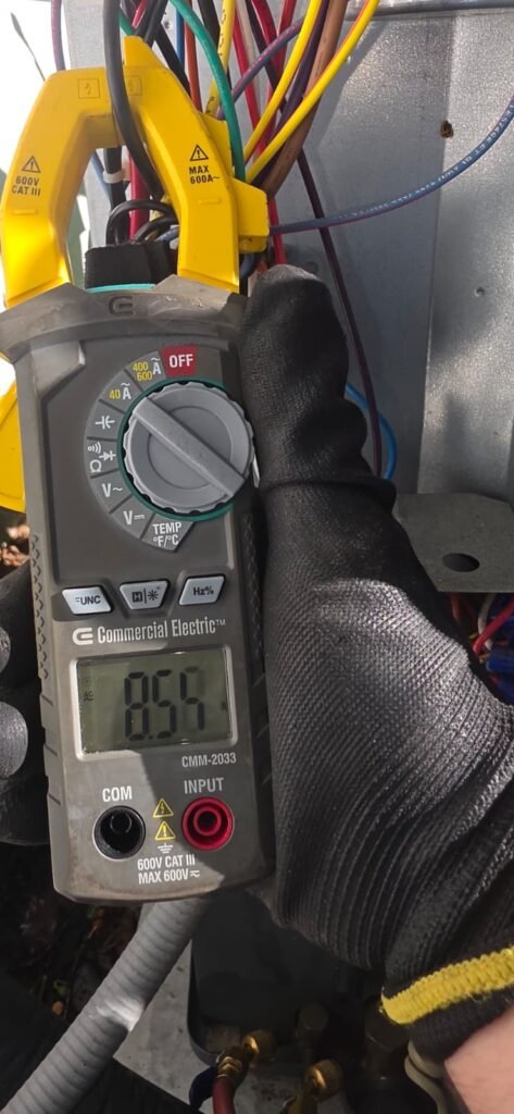 Multimeter reading during HVAC service in Tampa, FL 33603
