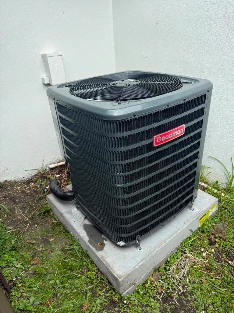 A new Goodman condenser on its pad in Tampa, FL 33624.