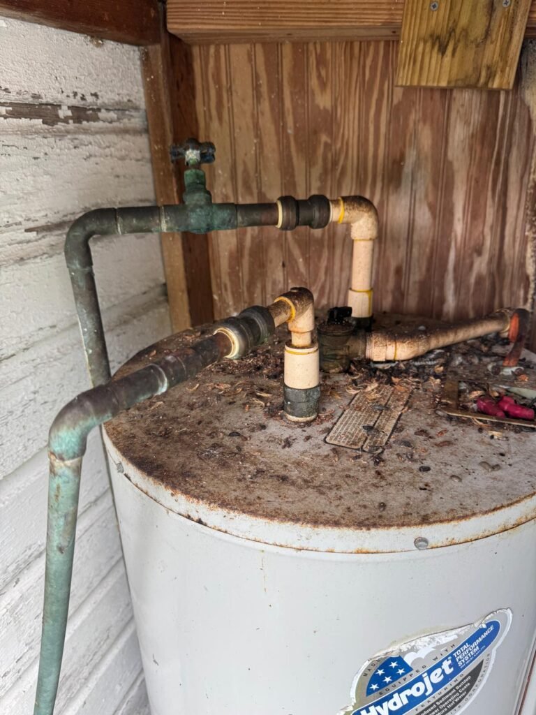 Close-up of old water heater pipes, St. Petersburg, FL 33704
