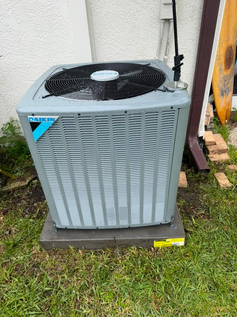 A Daikin condenser on its pad in Odessa, FL 33556.