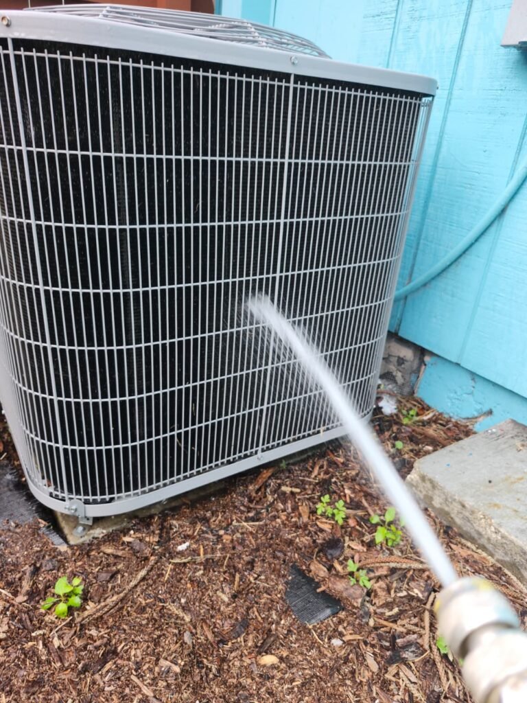 Rinsing Outdoor HVAC Unit in St. Petersburg, FL 33711 Rinsing outdoor HVAC unit in St. Petersburg, FL 33711