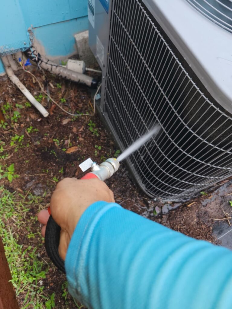 Technician Cleaning HVAC Unit in St. Petersburg, FL 33711 Technician cleaning HVAC unit in St. Petersburg, FL 33711