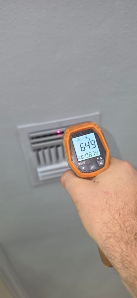 Temperature check during HVAC service in Tampa, FL 33603