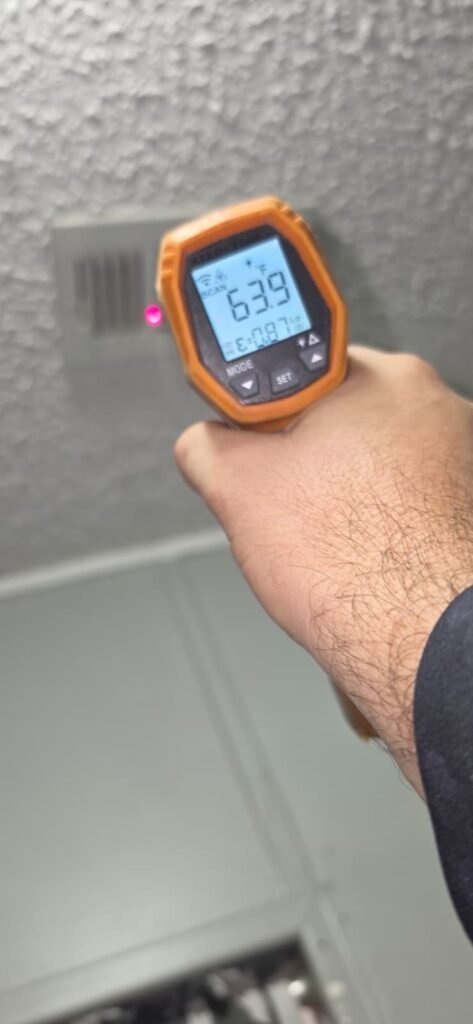 Temperature Reading in Spring Hill, FL 34610 Temperature gun reading near air vent in Spring Hill, FL 34610