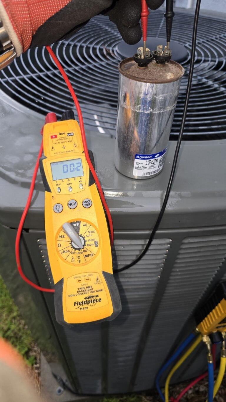 Testing Capacitor on HVAC Unit in Tampa, FL 33624 Multimeter testing capacitor on HVAC unit in Tampa, FL 33624