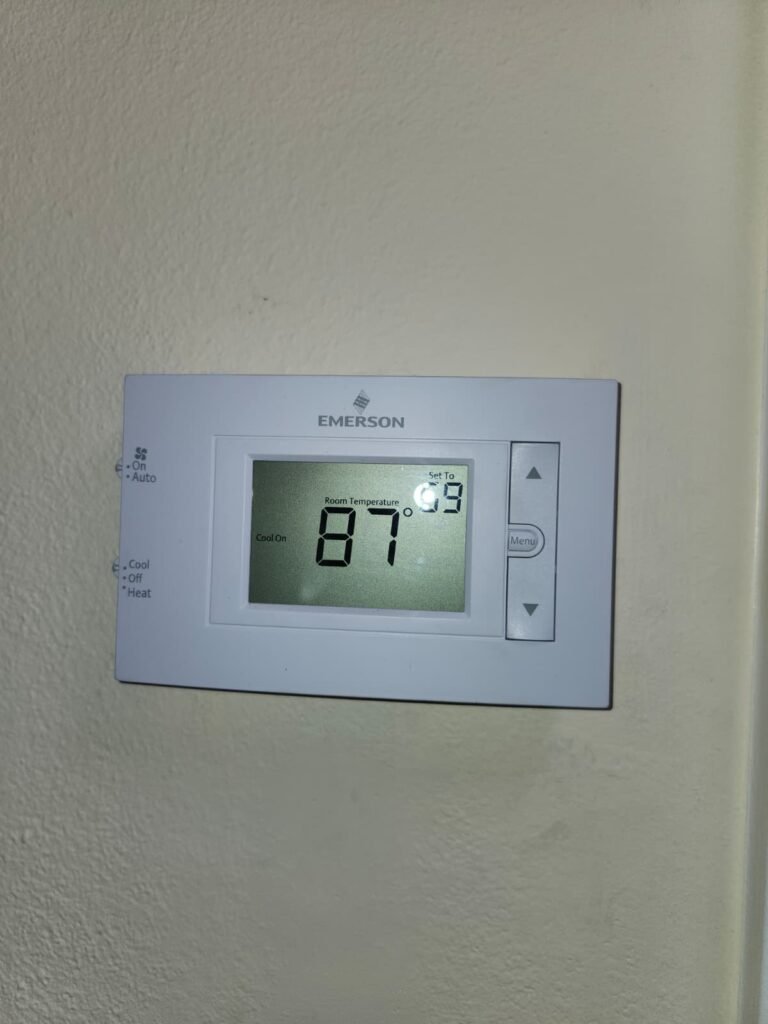 Digital thermostat showing room temperature, New Port Richey, FL 34653