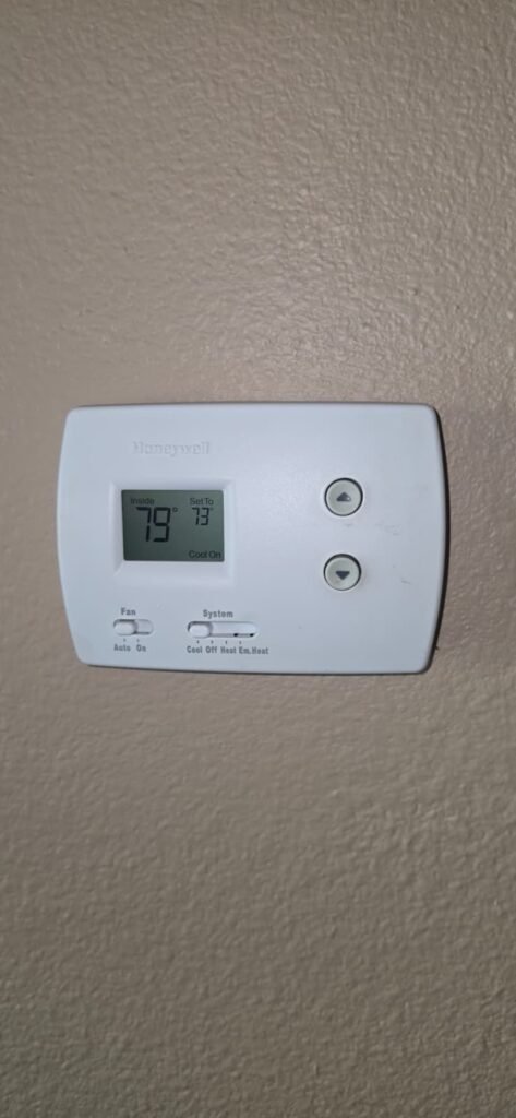 Thermostat showing temperature settings, Trinity, FL 34655