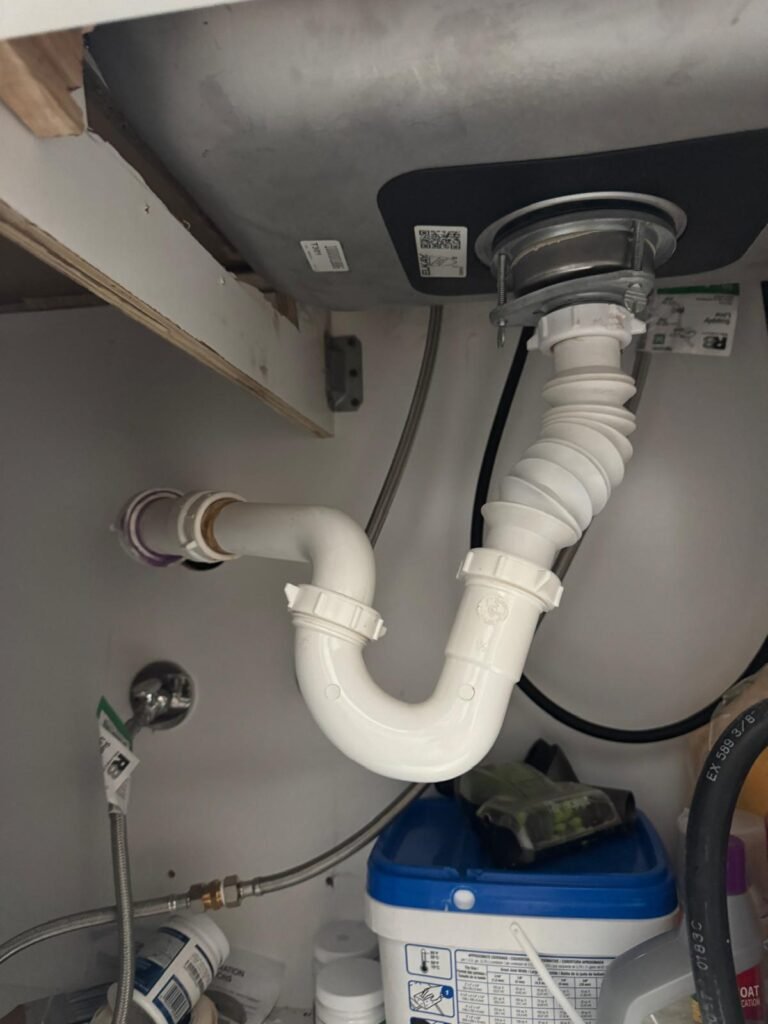 Under-Sink Plumbing Detail in Lutz, FL 33559 Under-sink plumbing detail after sewer drain unclogging in Lutz, FL 33559