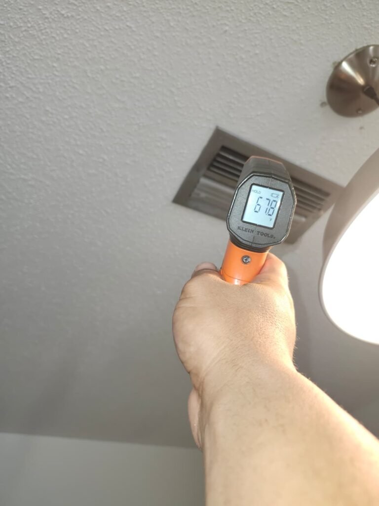 Temperature check at vent near light in Hudson, FL 34667