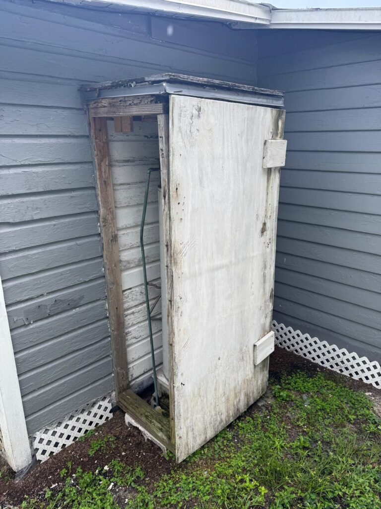 Wooden enclosure for water heater, St. Petersburg, FL 33704