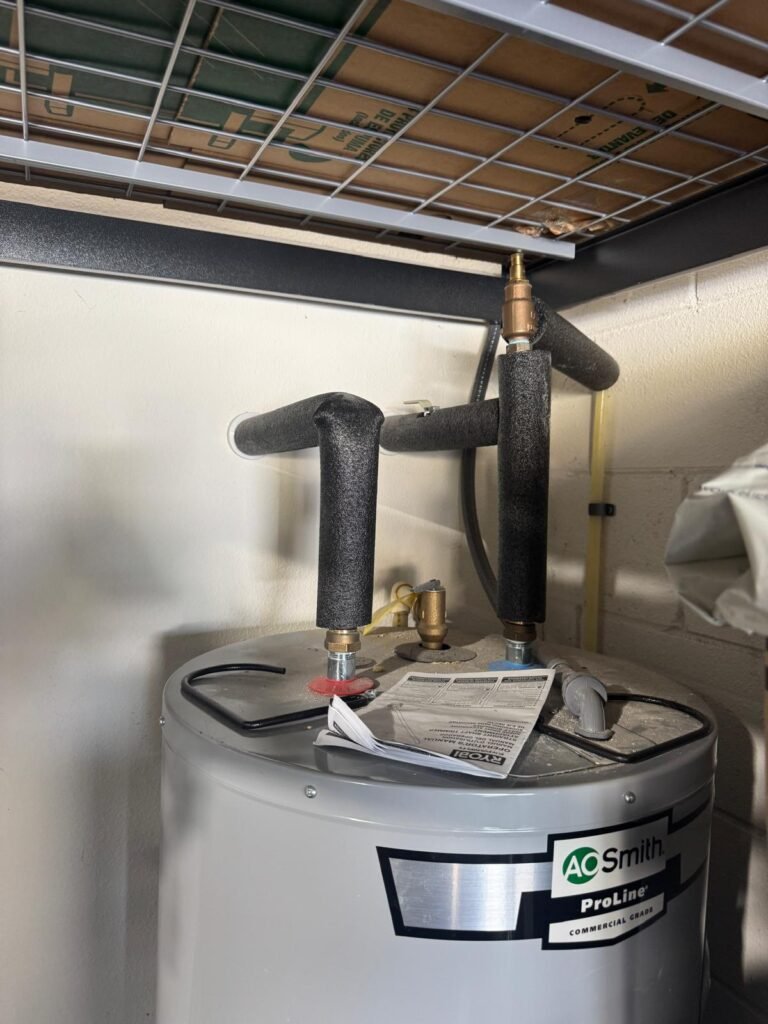 Top view of water heater with pipes in Wesley Chapel, FL 33545