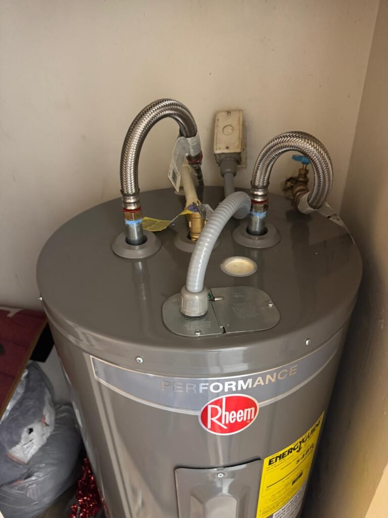 Angle view of Rheem water heater connections, Tampa, FL 33612