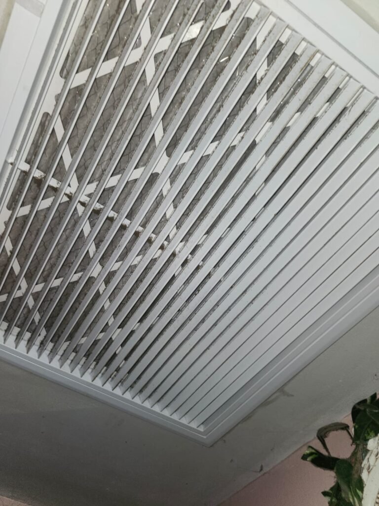 Ceiling vent and air filter during HVAC service in St. Petersburg, FL 33714