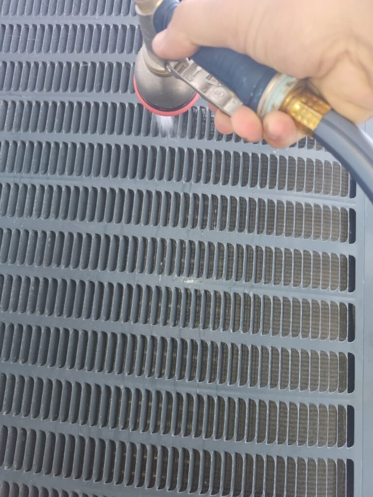 Condenser Cleaning in Saint Petersburg, FL 33703 Close-up of condenser cleaning, Saint Petersburg, FL 33703