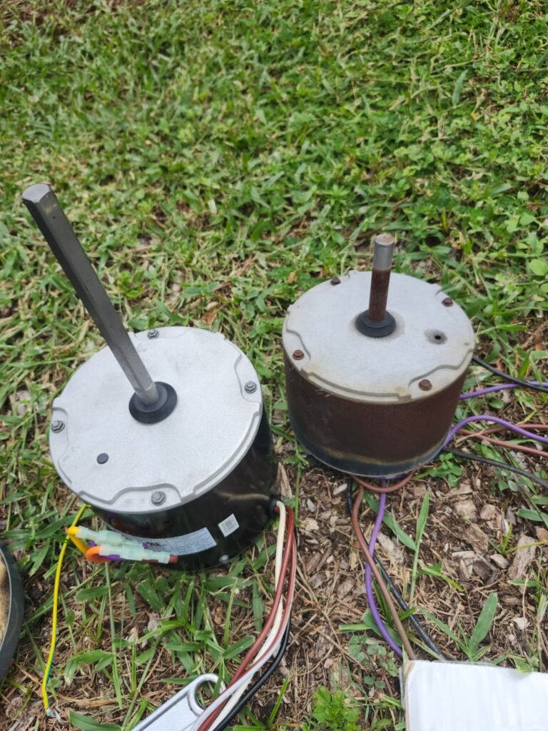 An old and a new condenser fan motor side by side in St. Petersburg, FL 33709.