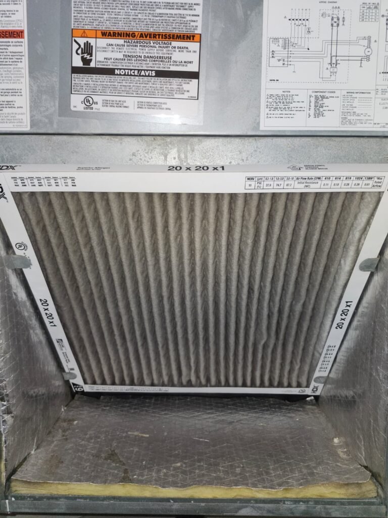 A dirty air filter in an air handler in St. Petersburg, FL 33712.