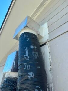 Close-up of disconnect box on exterior wall in Tampa, FL 33615